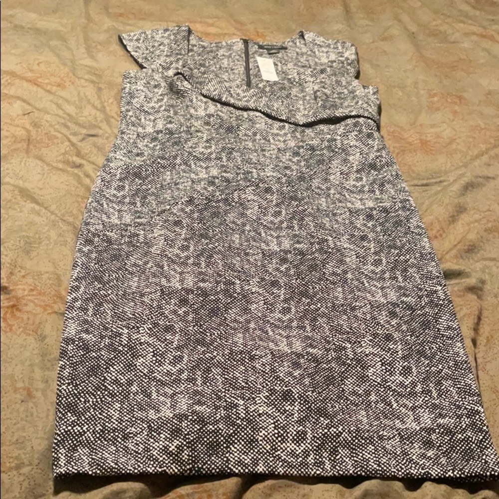 Sleeveless black and white winter power dress